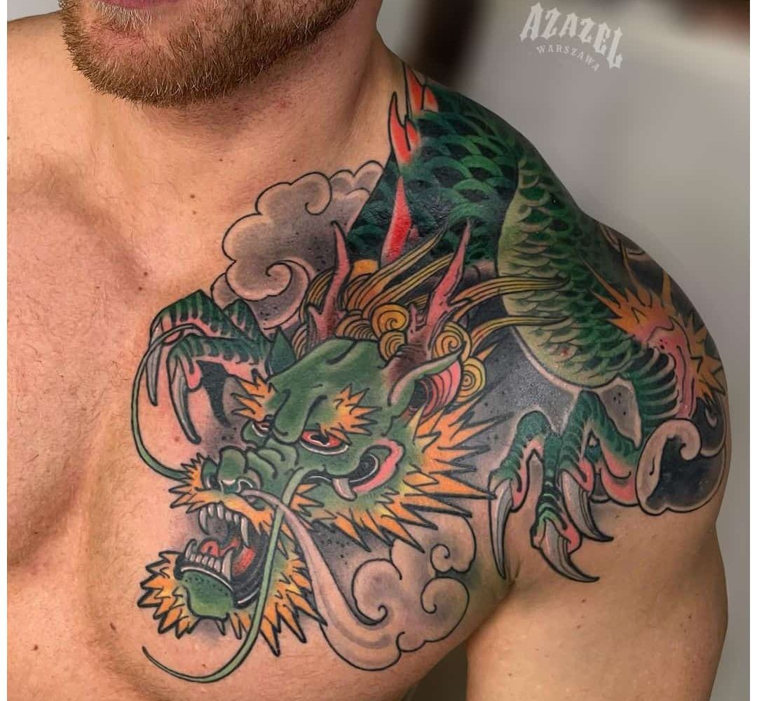 Tatuaż męski smok na ramieniu